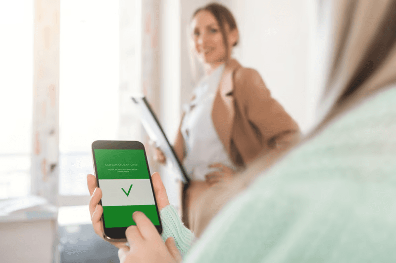 User verification approval confirmed on smartphone with advisor