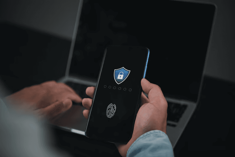 Security shield and biometric fingerprint authentication on mobile device