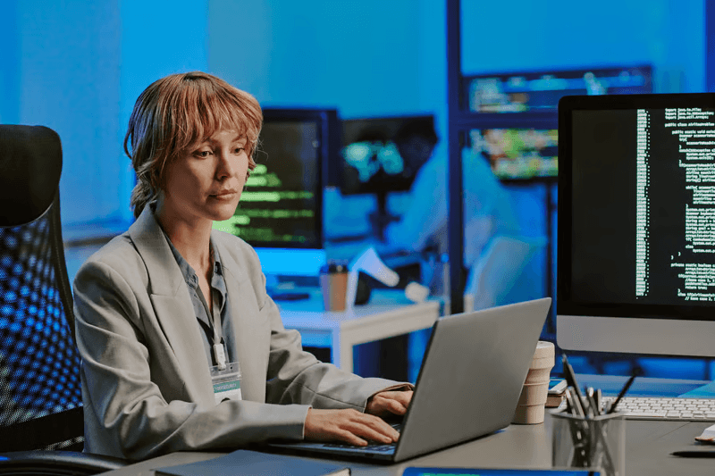 Security and operations engineer working at workstation