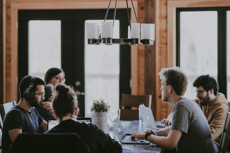Team collaboration around table in accessible meeting room