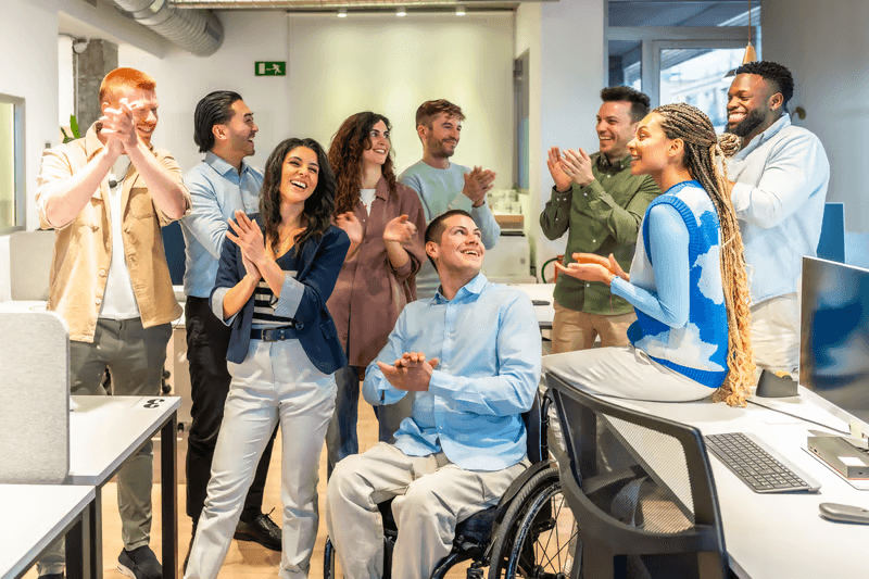 Colleagues collaborating in an accessible office