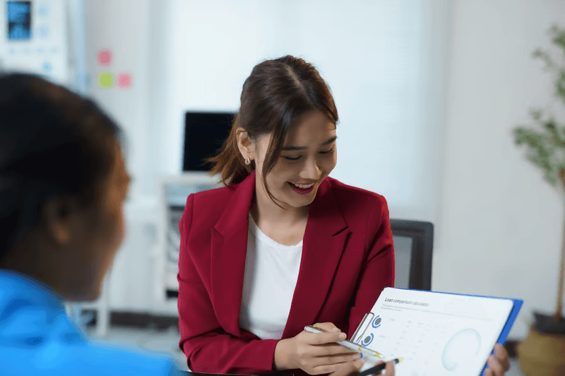 Business professional reviewing verification documentation