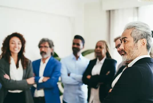 Colleagues talking together in an office