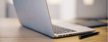 Laptop on desk closeup