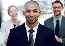 Human in a suit smiling