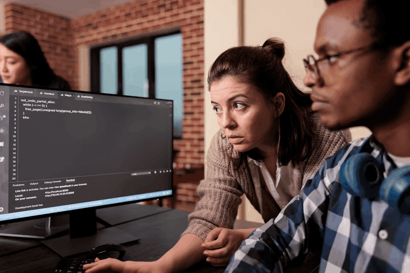 Developers working together on code
