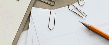 Papers and stationery on a desk