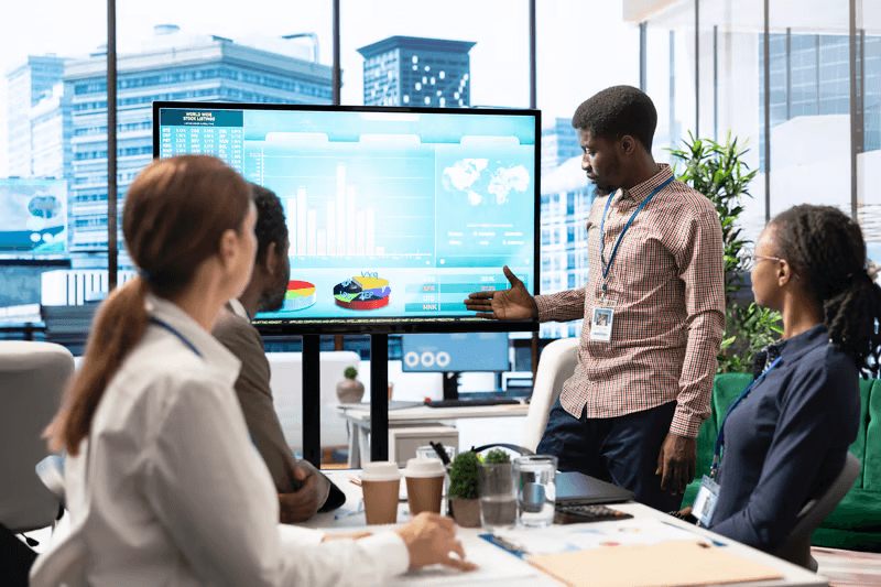 Auditors and executive board reviewing compliance trail