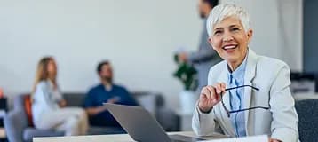 Security lead smiling during a team discussion